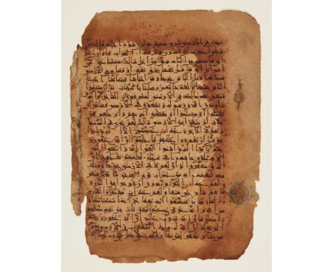 An Eastern Kufic Qur'an folio, Abbasid Persia or Iraq, 11th century, Arabic manuscript on thick buff paper, 23 lines of Easte