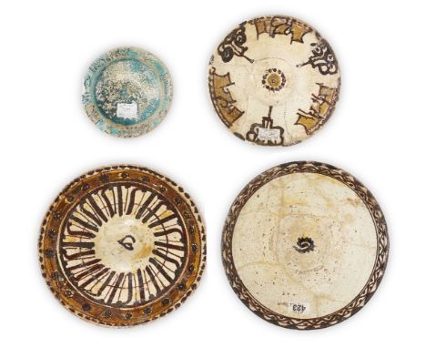 Four Nishapur pottery bowls, Iran, 10th-11th century, three of conical form and underglaze painted in brown, cream and ochre,