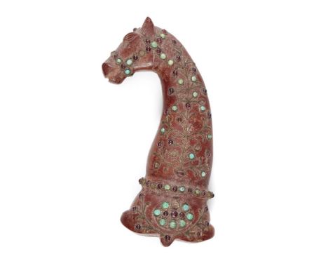 A ruby- and turquoise-set red hardstone hilt, India, late 19th century, the terminal in the form of a horse's head, the pomme