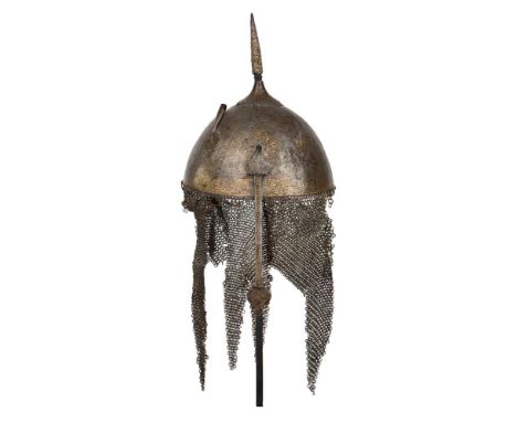 An inscribed gold damascened steel helmet (khula khud) and armguard, probably Iran, 18th century, the helmet of typical high 