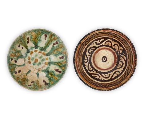 Two Nishapur conical pottery bowls, Iran, 10th century, the first underglaze painted in ochre, red and brown with arabesque d