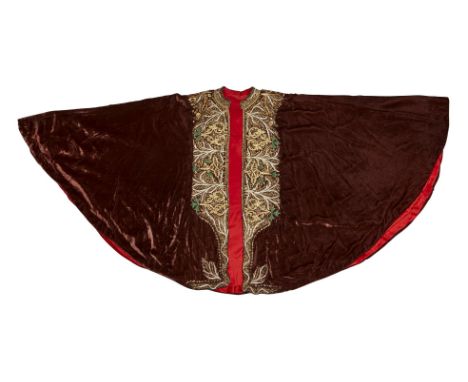 A gilt-metal thread embroidered purple velvet man's cloak Ethiopia, early 20th century, the short cloak with panels of embroi