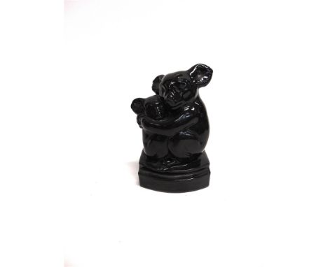 CHRISTINE GREGORY FRBS (1879-1963) a ceramic group modelled as a koala and cub, incised signature to base, 14.5cm high Note: 