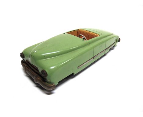 A JNF TINPLATE CONVERTIBLE MOTOR CAR  green, with steerable front wheels and a clockwork motor, the underside marked 'made in