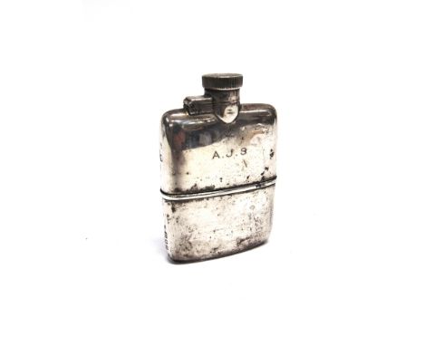 A SILVER HIP FLASK by Goldsmiths & Silversmiths Co Ltd, London 19  , with pull off cup base, captive bayonet top, 10.5cm long