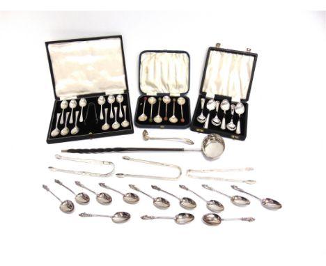 A COLLECTION OF SILVER FLATWARE  comprising; a cased set of twelve silver teaspoons with tongs; a cased set of six silver tea