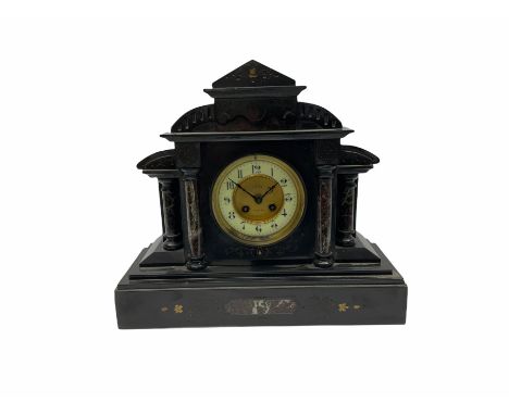 19th century Belgium slate mantle clock with an eight-day French rack striking movement striking the hours and half-hours on 