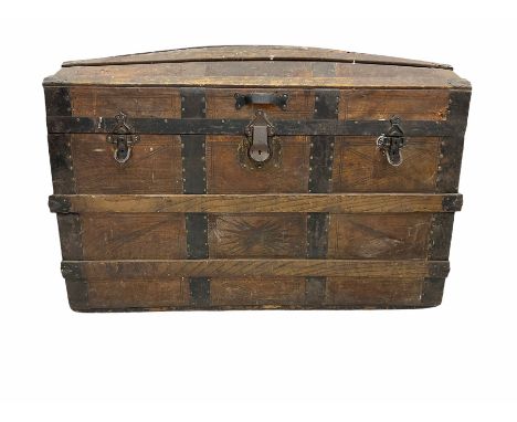 Early 20th century wood and metal bound dome top travelling trunkDimensions: Height:&nbsp;62cm&nbsp; Length/Width:&nbsp;93cm&