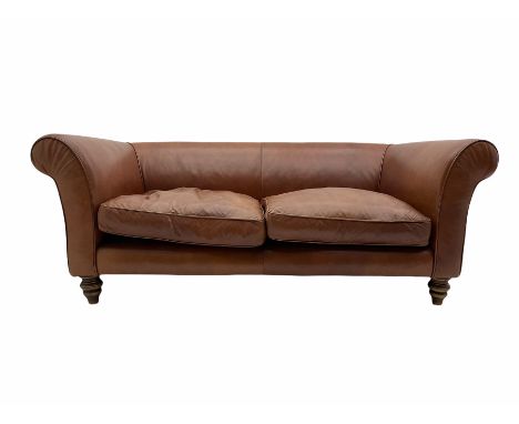 Two seat sofa, upholstered in tan leather, turned walnut feetDimensions: Height:&nbsp;75cm&nbsp; Length/Width:&nbsp;180cm&nbs