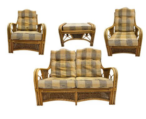 Two seat bamboo and cane conservatory sofa, and pair of matching armchairs with footstool and cane nest of tables 