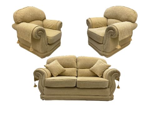 Three piece lounge suite upholstered in beige plain and embossed fabric, comprising two seat sofa and pair of armchairsDimens