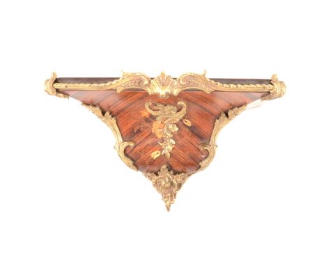 Kingwood and ormalu-mounted clock wall bracket, late 20th century, width 36cm, height 20cm, depth 17.5cm.