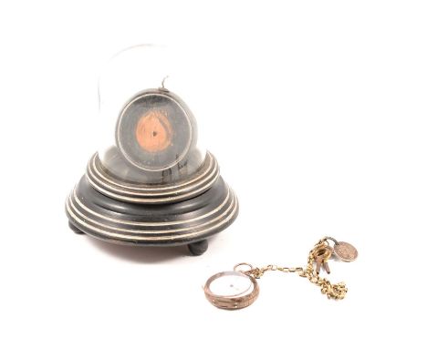 Ebonised pocket watch stand with glass dome, 14cm, together with a Continental white metal pocket watch, stamped 935, engine 