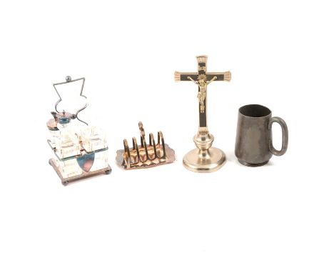 Small quantity of plated wares including a cruet stand with four cut glass bottles, German plate and ebony crucifix, table li