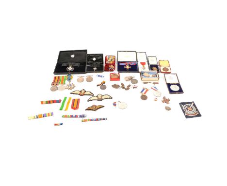 A collection of medals, badges and awards relating to Nursing Sister Harriet. O. Luckie, including Order of St John medal and