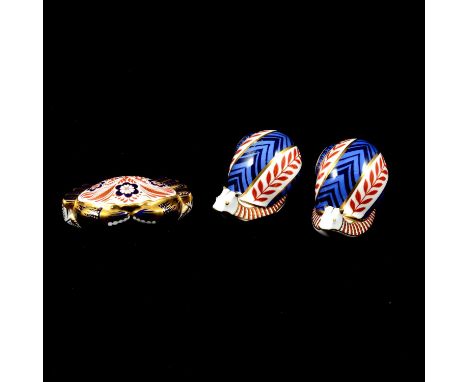 Three Royal Crown Derby paperweights - two snails with gold buttons12.5cm long,  and a crab with silver button, 11.5cm.Qty: 3