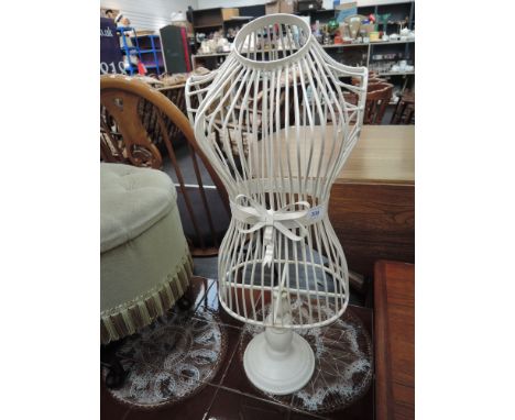 A vintage style miniature dressmakers dummy ornament