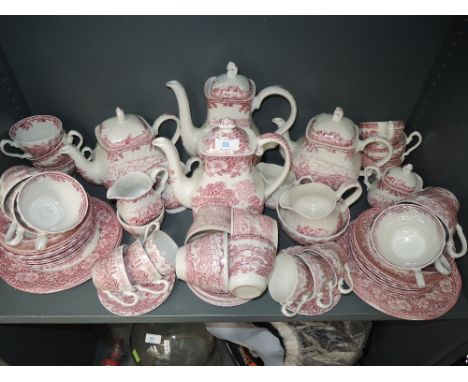 A large part tea or dinner service by Enoch Wedgwood in the Woodland design