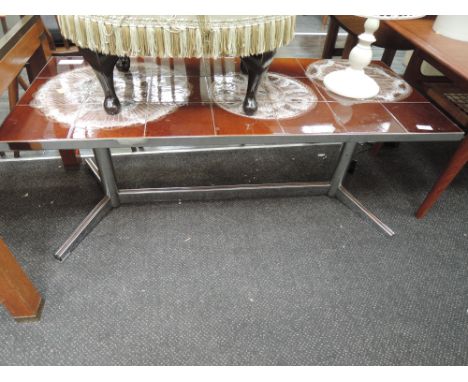 A vintage tile and chrome coffee table