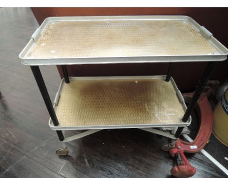 A vintage aluminium tea trolley