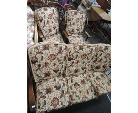 A dark stain Ercol cottage suite