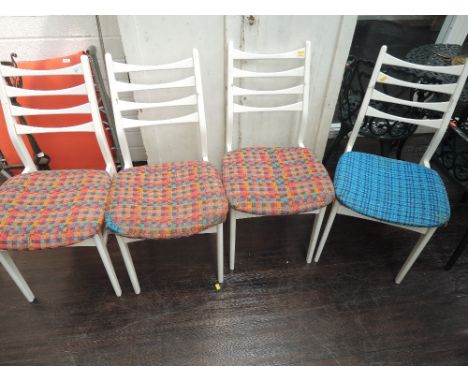 A set of 4 vintage painted stylised ladder back dining chairs