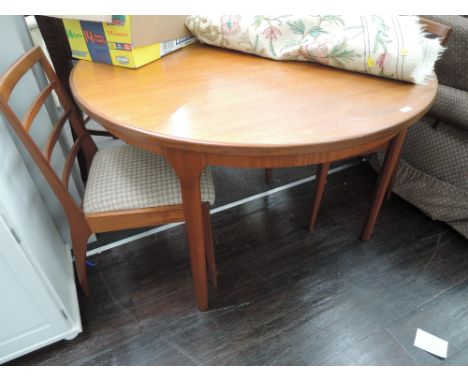 A Mid Century vintage McIntosh circular dining table and 4 chairs