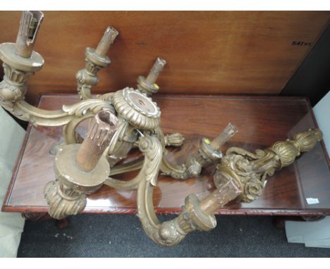 A vintage gilt plaster ceiling light electrolier of scroll design