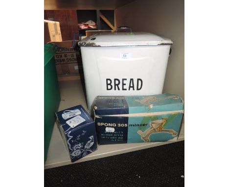 A selection of kitchen wares including large enamel breadbin  and boxed Spong mincer