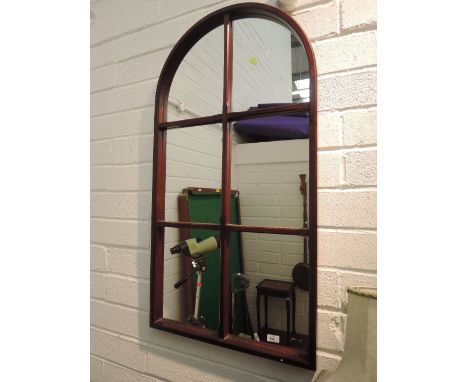 A vintage mahogany effect arch window effect mirror
