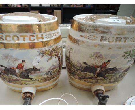 A pair of early 20th century pottery tavern barrels for Port and Scotch, with pictorial hunting interest