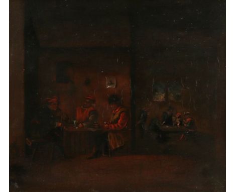 Follower of Adriaen van Ostade (1610-1685) Tavern interior with seated figures, oil on panel, lettering verso Ostade pinxit, 