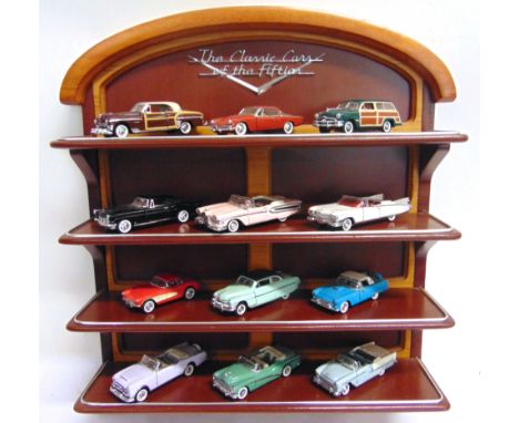 A SET OF TWELVE 1/43 SCALE FRANKLIN MINT 'THE CLASSIC CARS OF THE FIFTIES'  each mint or near mint, all unboxed; together wit