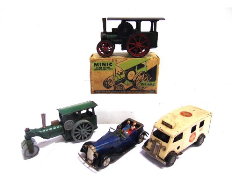 FOUR TRI-ANG MINIC TINPLATE MODEL VEHICLES  post-war, including a Traction Engine and an Ambulance, each with a clockwork mot