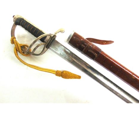 A BRITISH 1821 PATTERN OFFICER'S SWORD  the 89cm slightly curved polished blade with indistinctly etched decoration, the rica