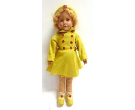A DEAN'S RAG BOOK COMPOSITION &amp; CLOTH DOLL  with a blonde wig, and printed and painted facial features, on a jointed body