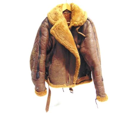 A SECOND WORLD WAR R.A.F. IRVIN STYLE BROWN LEATHER FLYING JACKET  electrically wired thermally insulated, with a sheepskin l