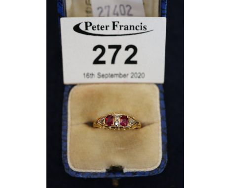 18ct gold ruby and diamond ring. Ring size K. Weight approximately 2.5g. (B.P. 21% + VAT) very minor wear and scratches only