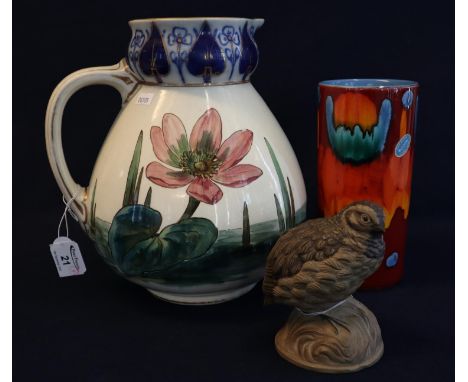 Poole pottery cylindrical lava type vase, together with a Poole pottery study of a thrush probably by B Linley Adams, togethe