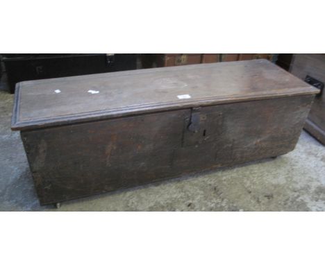 17th Century style oak trunk or chest with fitted candle box and metal locks on associate casters. (B.P. 21% + VAT) 