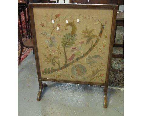Early 20th Century firescreen on stand depicting exotic bird amongst foliage. (B.P. 21% + VAT) 