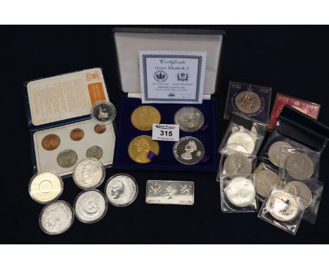 Bag of coins to include; Queen Elizabeth II limited edition 2002 sterling silver plated and 22ct gold plated coins, Britains 