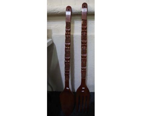 Large pair of carved fork and spoon probably for display purposes.(B.P. 21% + VAT) 