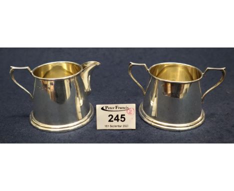 Matching silver conical shaped cream jug and matching two handled sucrier, Birmingham hallmarks. 3.6 troy ozs approx.(B.P. 21