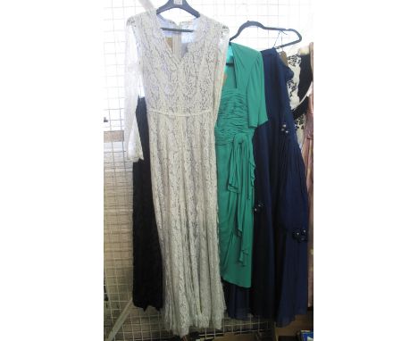 A collection of ladies vintage clothing to include; a vintage floor length white lace Frank Usher dress, a 50's/60's style gr