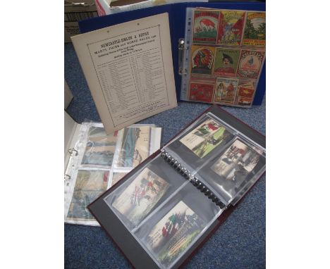 Ring binder album of Japanese postcards, topographical, military, First World War etc. Together with an album of match box/sa