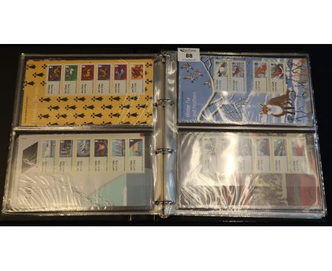 Great Britain range of Post and Go stamps in presentation packs, mint strips and on First Day Covers in black FDC album.(B.P.