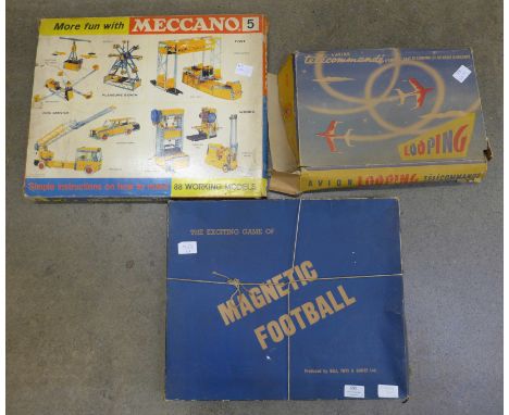 A Meccano Engineering set, No.5, a magnetic football game and a L'avion Looping aeroplane toy 