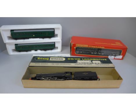 A Tri-ang Wrenn 00 gauge 8F 2-8-0 locomotive and tender and a R.157 diesel railcar power and trailing units 