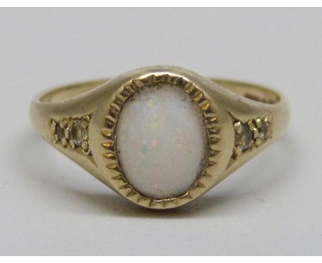 A 9ct white gold, opal solitaire ring, 1.8g, M 